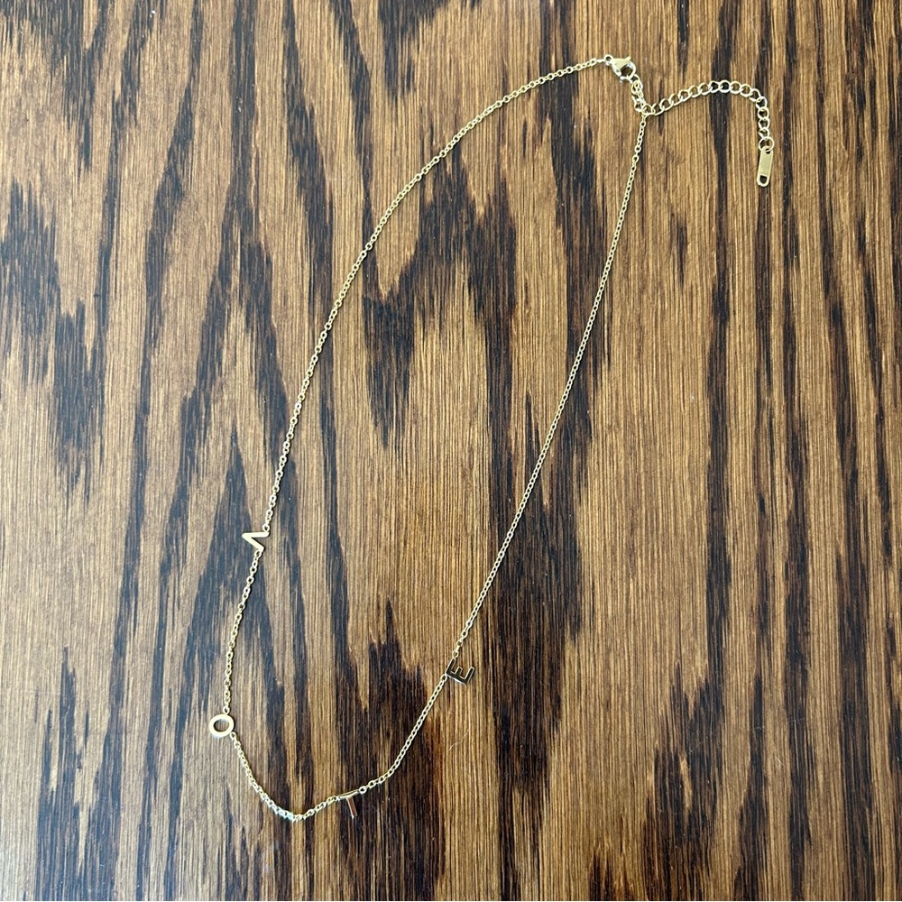 Gold “VOTE” necklace